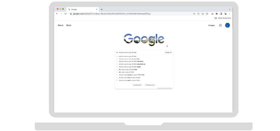 Google homepage displayed in a web browser on a laptop screen, showing search suggestions in the search box beneath the Google logo.