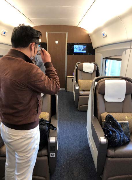 Man riding the high-speed railway.